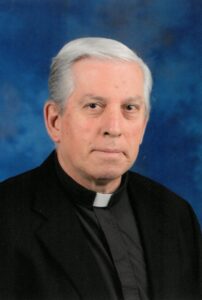 Rev.  John J. Serio